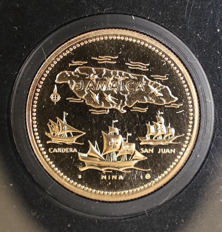 A Jamaica 1972 10th anniversary of independence proof gold $20, an Edward VII gold half sovereign 1903 and a China gold 5 yuan 1997